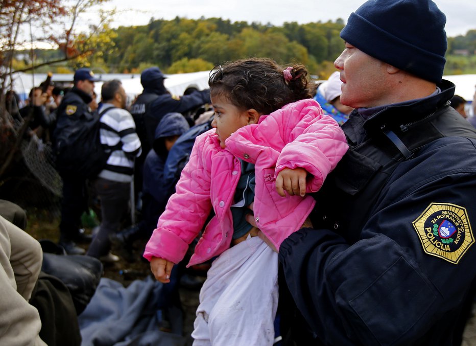 Fotografija: Otroci so v glavnem prišli s svojimi družinami, eden je bil na avtobusu sam. FOTO: Reuters