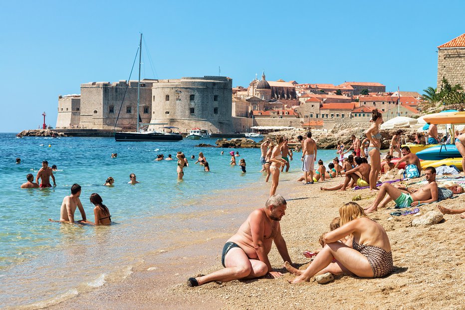 Fotografija: Številni Slovenci so komaj čakali, da se odpre meja s Hrvaško. FOTO: Guliver/Getty Images