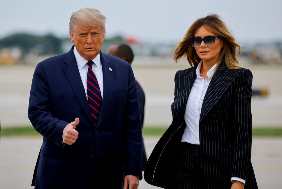 Fotografija: Donald in Melania Trump sta okužena s koronavirusom. FOTO: Carlos Barria, Reuters