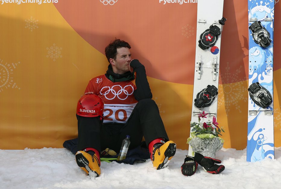 Fotografija: Medalja z grenkim priokusom. FOTO: Reuters