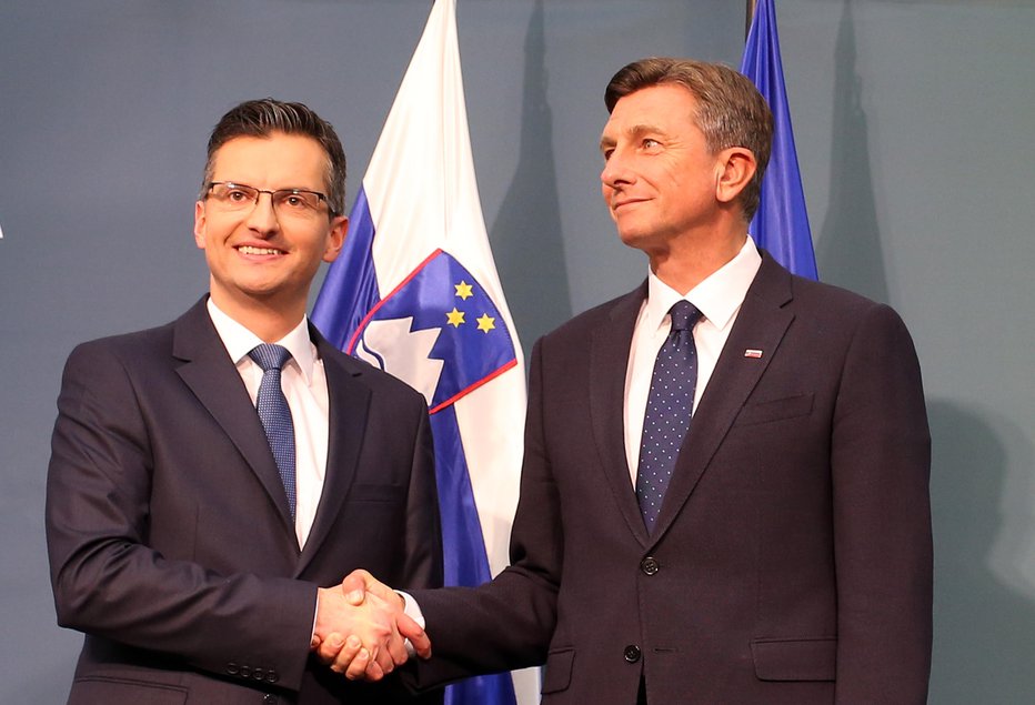 Fotografija: Borut Pahor po zmagi na predsedniških volitvah 2017 in Marjan Šarec. FOTO: Tomi Lombar/delo