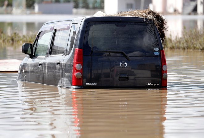 Posledice deževja. FOTO: Reuters