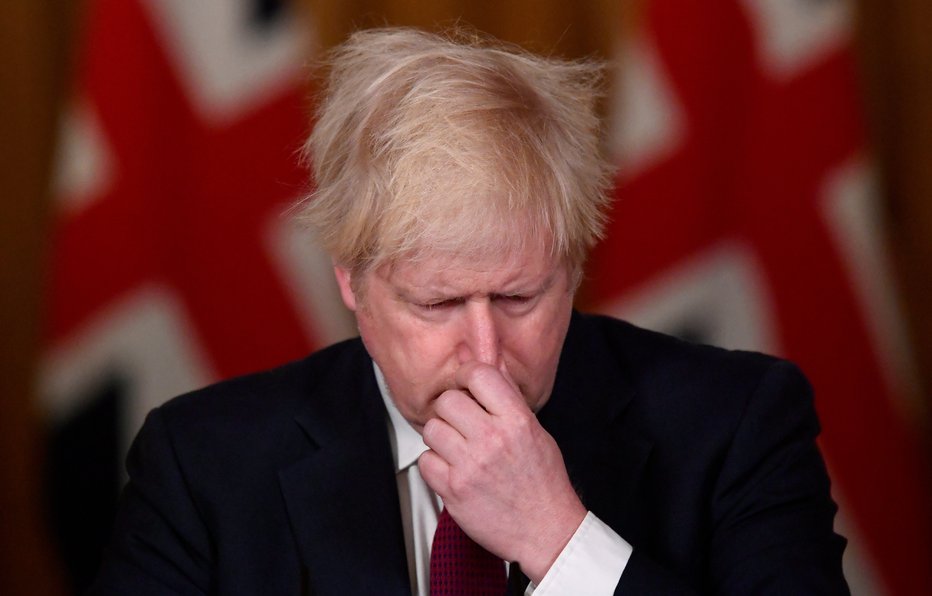 Fotografija: Britanski premier Boris Johnson. FOTO: Toby Melville, Reuters