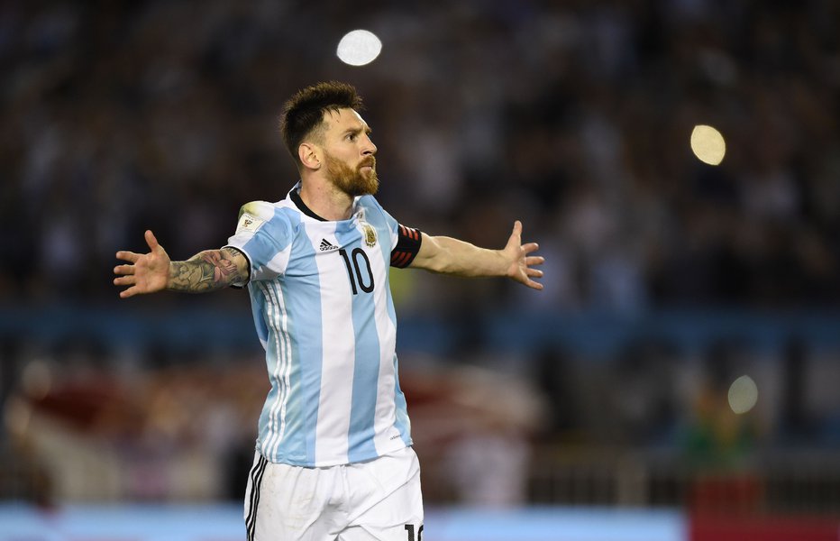 Fotografija: (FILES) In this file photo taken on March 23, 2017 Argentina's Lionel Messi celebrates after scoring against Chile during their 2018 FIFA World Cup qualifier football match at the Monumental stadium in Buenos Aires, Argentina. / AFP PHOTO / EITAN ABRAMOVICH