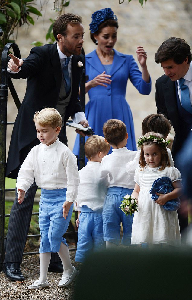 Fotografija: George je bil tokrat boljše volje kot Charlotte.