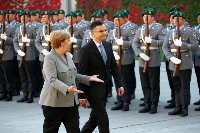 Nemška kanclerka Angela Merkel in slovenski predsednik vlade Marjan Šarec. FOTO: Reuters