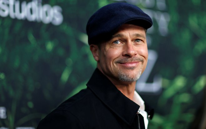 Brad Pitt na lanski premieri filma Izgubljeno mesto Z, kjer je sodeloval kot producent. FOTO: Reuters