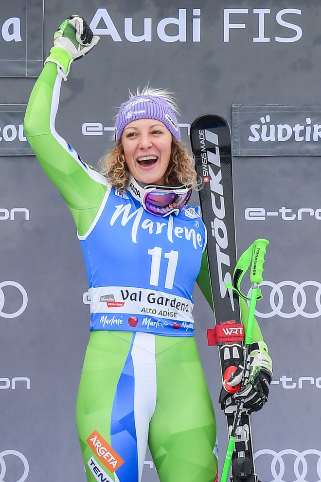 Slovenia's Ilka Stuhec celebrates on the podium after winning the FIS Alpine World Cup Women Super G on December 19, 2018 in Val Gardena - Groeden, Italian Alps. (Photo by Tiziana FABI / AFP)