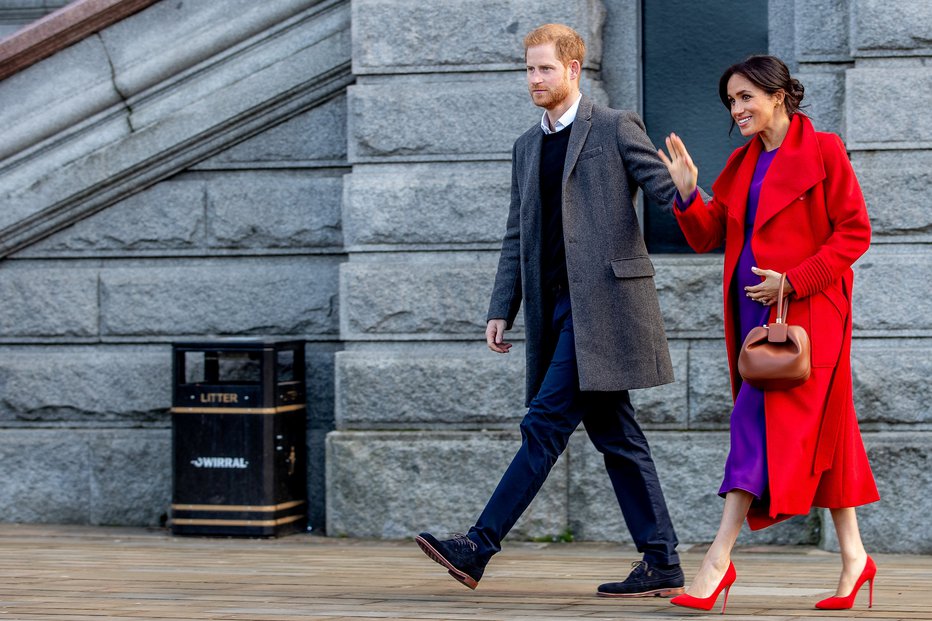 Fotografija: Meghan ponosno razkazuje svoj nosečniški trebušček. FOTO: Reuters