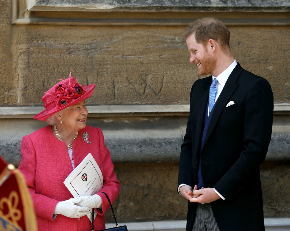 Fotografija: Poroke sta se udeležila tudi kraljica Elizabeta II. in njen vnuk princ Harry.