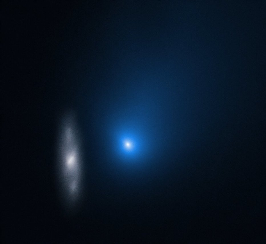 Fotografija: Komet, posnet s teleskopom Hubble. FOTO: Nasa, Esa in D. Jewitt (UCLA)