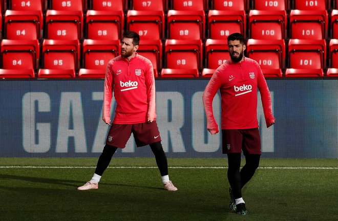 Kdo ju bo ustavil? Lionel Messi (12 golov) hiti proti naslovu prvega strelca lige prvakov v tej sezoni, Luis Suarez se počuti na Anfieldu kot doma. FOTO: Reuters