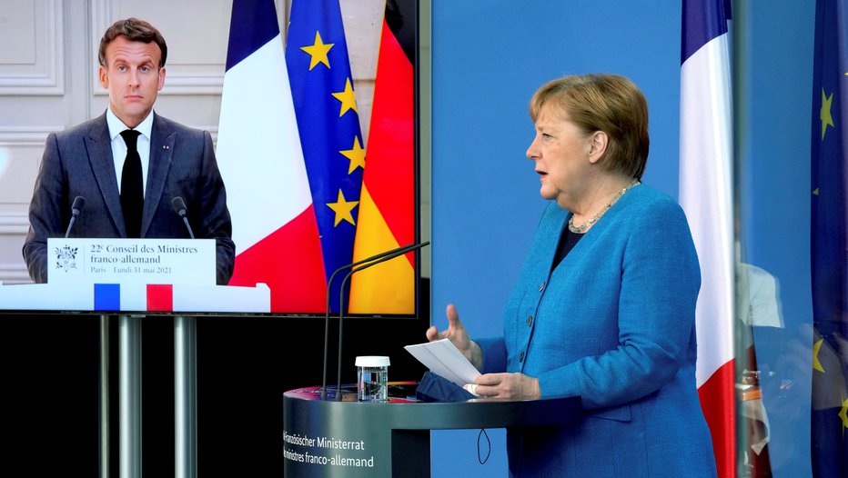 Fotografija: Emmanuel Macron in Angela Merkel FOTO: Michael Sohn, Pool Reuters