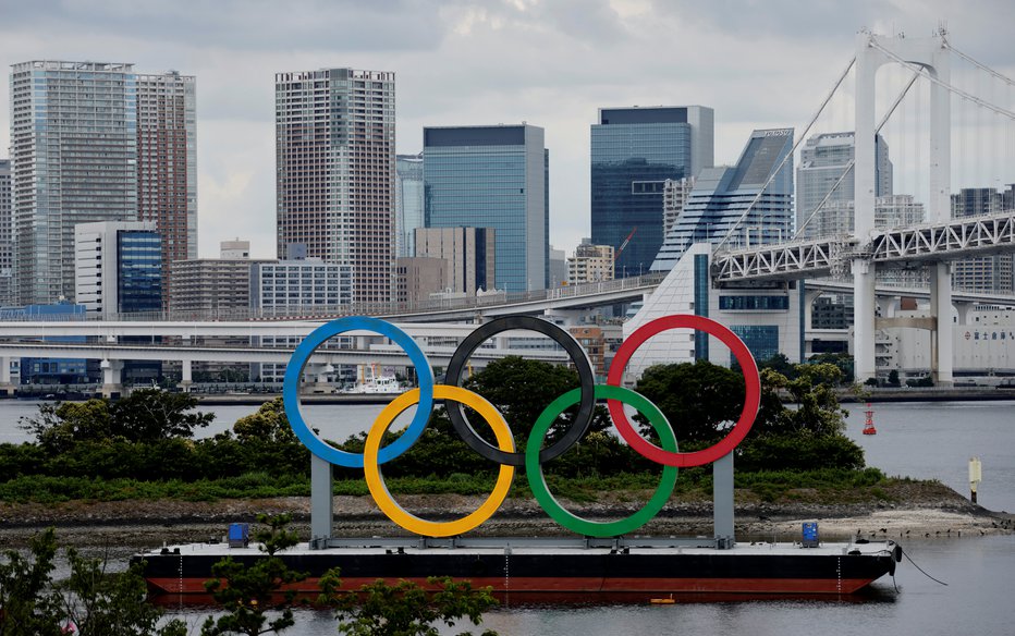 Fotografija: V Tokio se že zgrinjajo športniki iz vsega sveta. FOTO: Fabrizio Bensch, Reuters