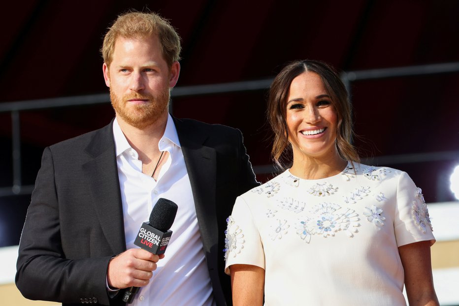 Fotografija: Harry in Meghan sta prvič pokazal tudi hčer. FOTO: Caitlin Ochs, Reuters
