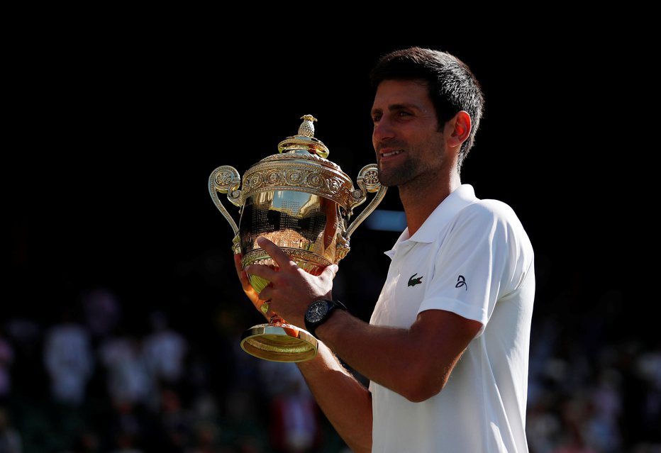 Fotografija: Novak Đoković je – tako kot Roger Federer in Rafael Nadal – osvojil že 20 lovorik za grand slam. FOTO: Andrew Boyers/Reuters
