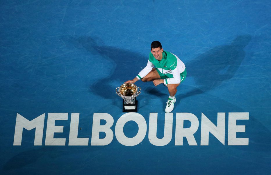 Fotografija: Novak Đoković še ni v Melbournu. FOTO: Kelly Defina/Reuters
