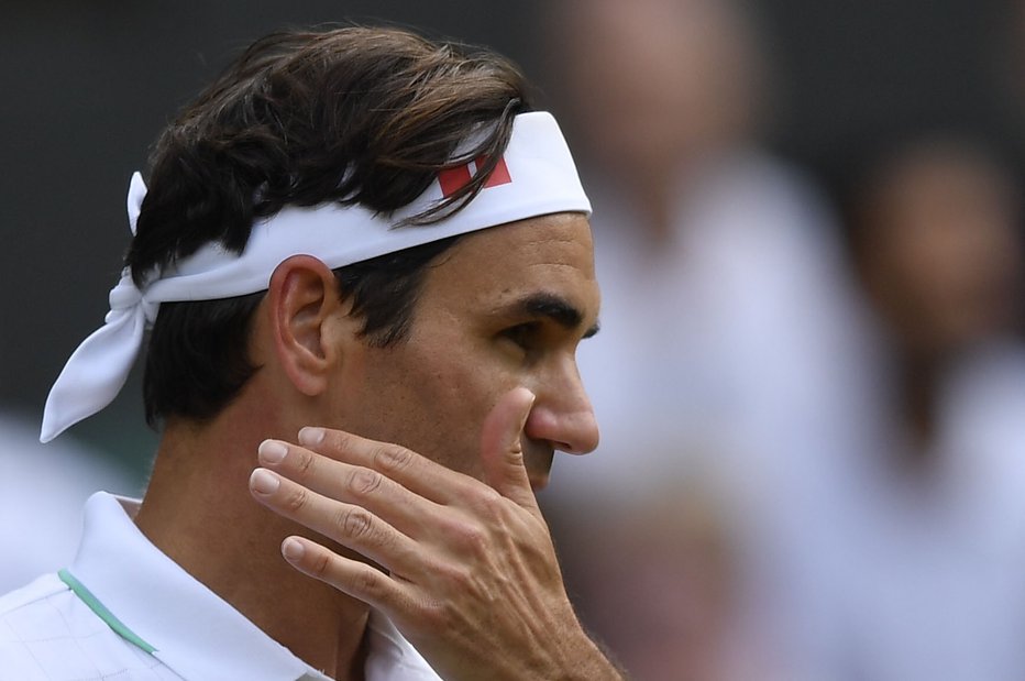 Fotografija: Federer je daleč od stare forme. FOTO: Toby Melville/Reuters