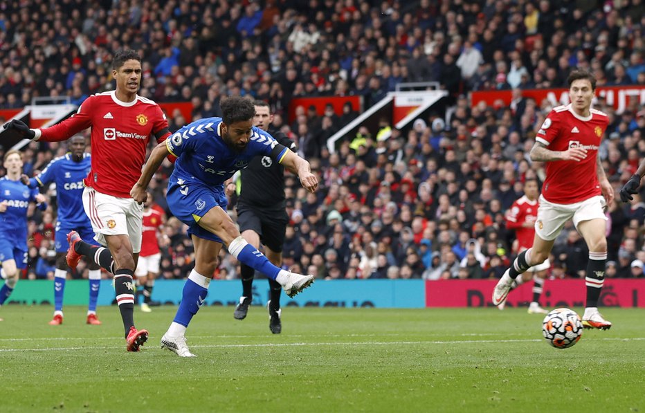 Fotografija: Andros Townsend je na Old Traffordu z zadetkom karamelam prinesel sladko točko. FOTO: Phil Noble/Reuters