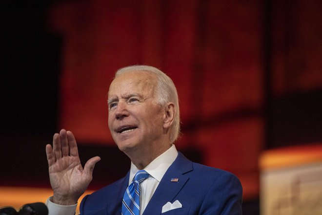 Novoizvoljeni ameriški predsednik Joe Biden je prepričan, da bodo Američani s skupnimi močmi premagali virus. FOTO: Mark Makela/AFP