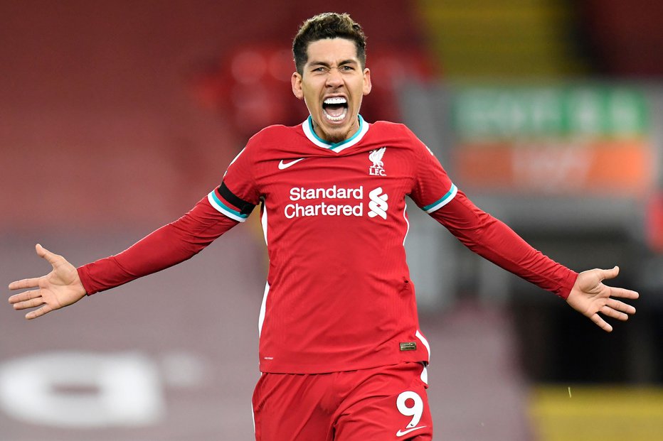 Fotografija: Roberto Firmino je bil junak tekme v Liverpoolu.FOTO: Peter Powell/AFP