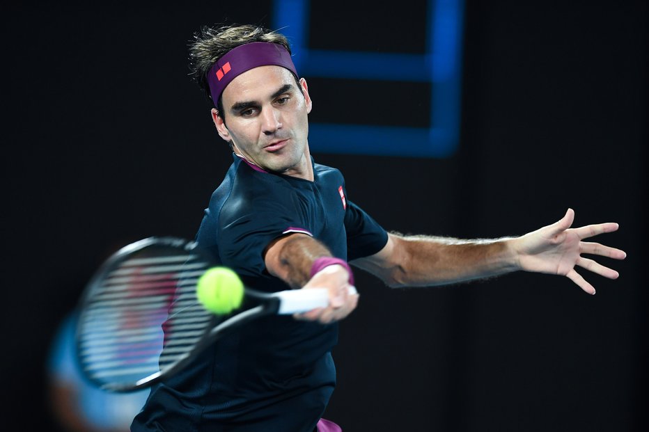 Fotografija: Roger Federer bo zavoljo okrevanja izpustil prvi grand slam sezone. FOTO: Greg Wood/AFP