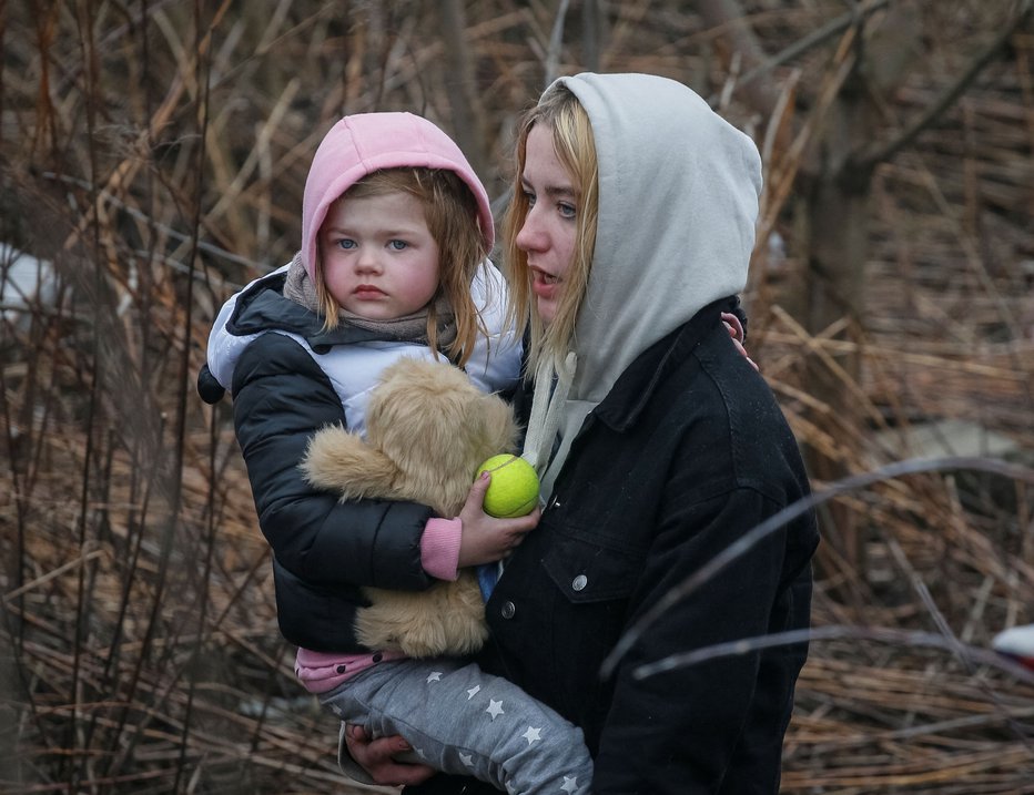 Fotografija: Fotografija je nastala v petek v mestu Irpinj. FOTO: Gleb Garanich, Reuters
