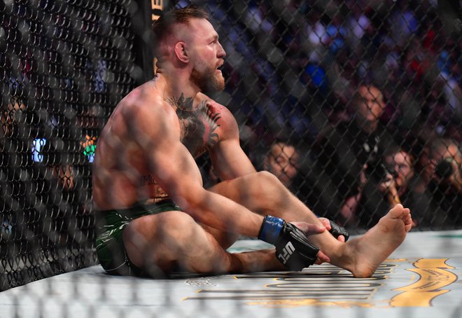 Conor McGregor je kljub hudi poškodbi napovedal, da s Poirierjem še ni poravnal računov. FOTO: Gary A. Vasquez/Usa Today Sports