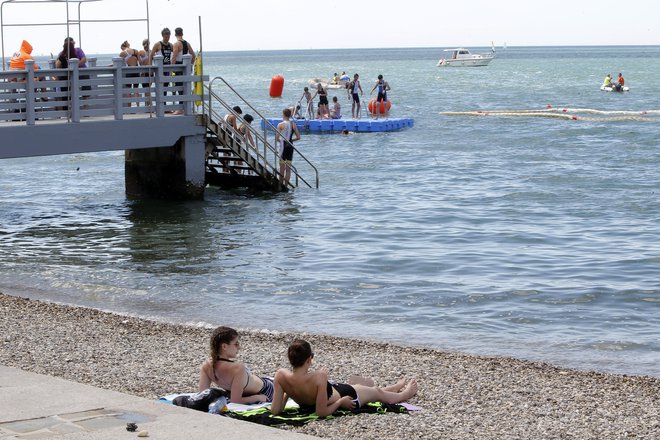 Na takšnih plažah jih boste težko našli. FOTO: Mavric Pivk
