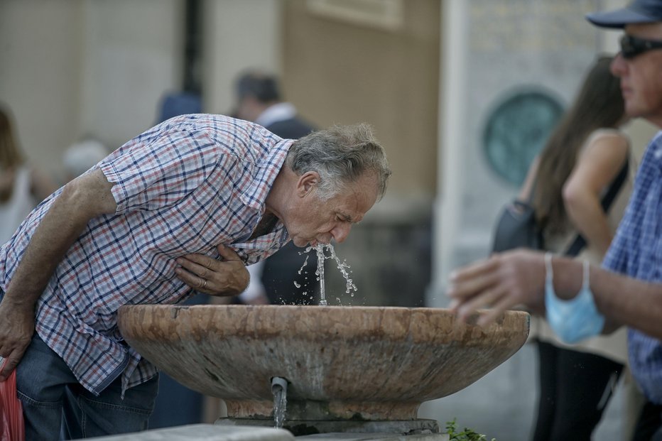 Fotografija: Vročina v Ljubljani (arhivska fotografija). FOTO: Blaž Samec, Delo
