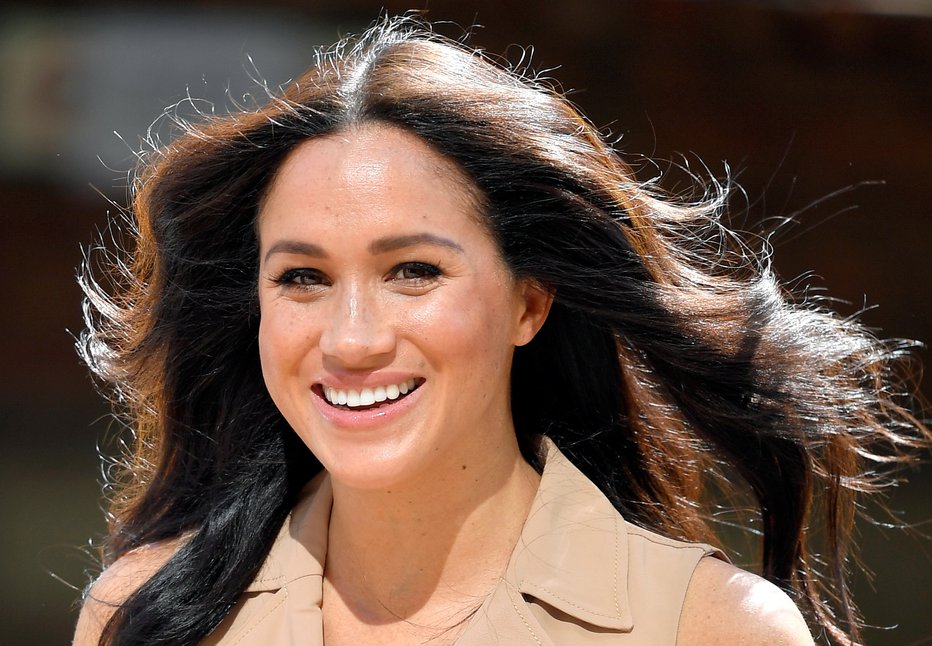 Fotografija: Meghan Markle med turnejo po Južni Afriki leta 2019. FOTO: Toby Melville, Reuters
