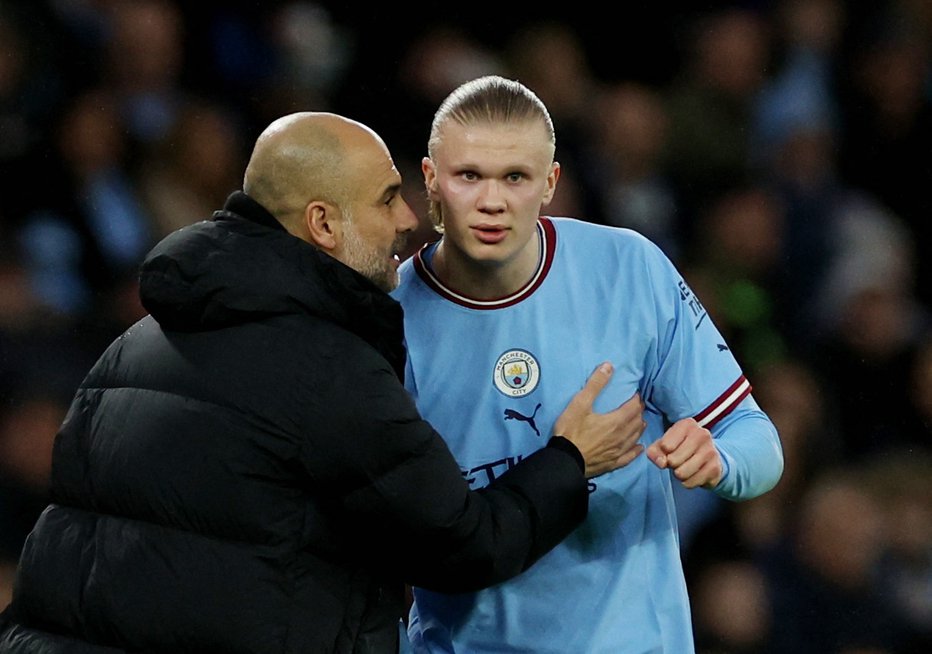 Fotografija: Pep Guardiola in Erling Haaland se zavedata velikosti izziva, ki ga predstavlja Bayern. FOTO: Phil Noble, Reuters