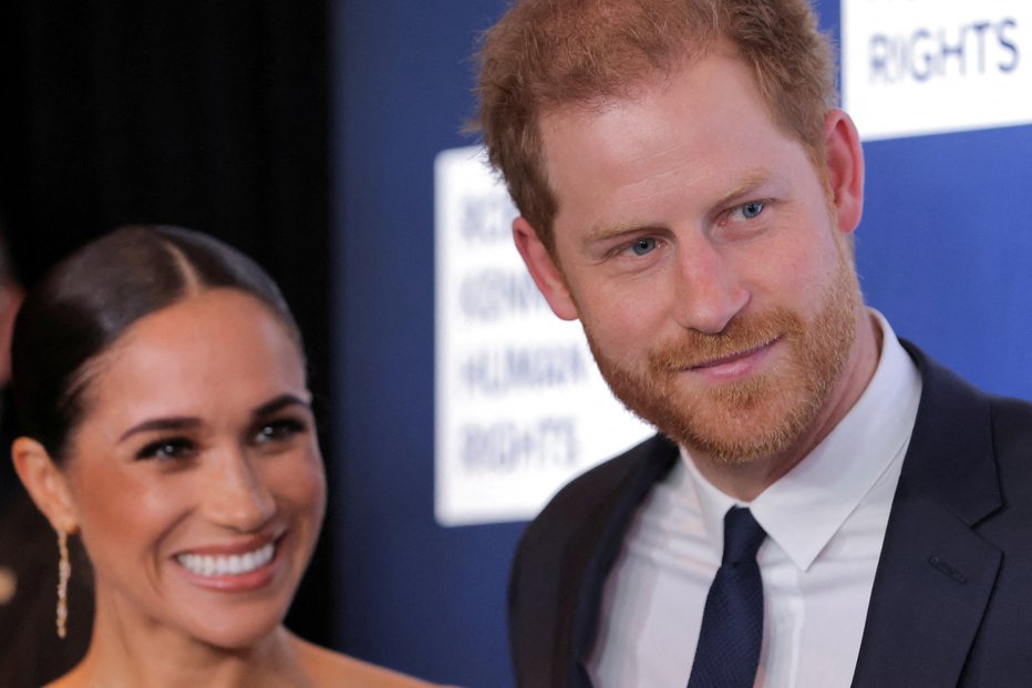 Fotografija: Princ Harry in Meghan. FOTO: Andrew Kelly Reuters