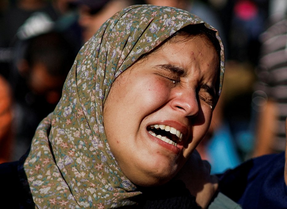 Fotografija: Smrt je v Gazi del vsakdanjika. FOTO: Mohammed Salem Reuters