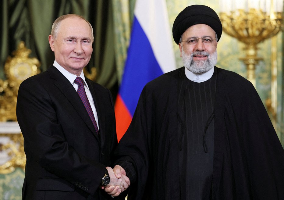 Fotografija: Vladimir Putin in Ebrahim Raisi. FOTO: Sputnik Via Reuters