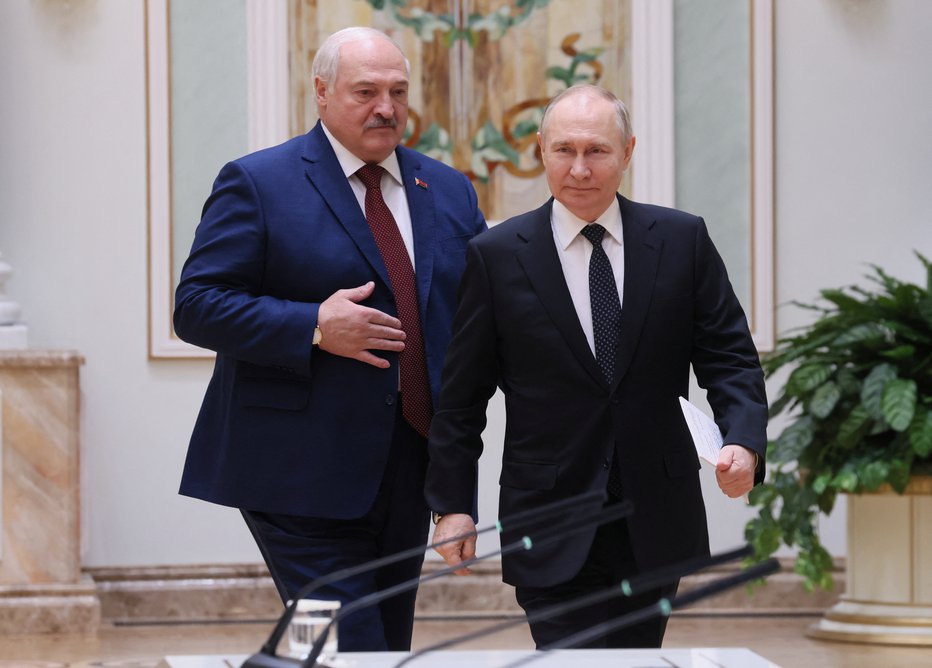 Fotografija: Vladimir Putin in Aleksander Lukašenko. FOTO: Mikhail Metzel Via Reuters
