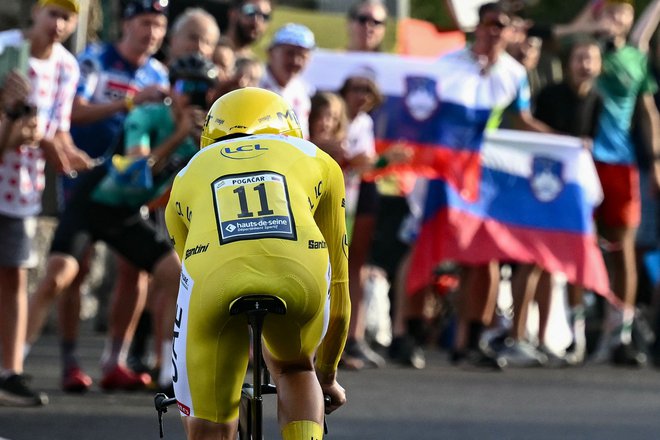 Slovenski heroj med vožnjo na kronometru. FOTO: Marco Bertorello Afp