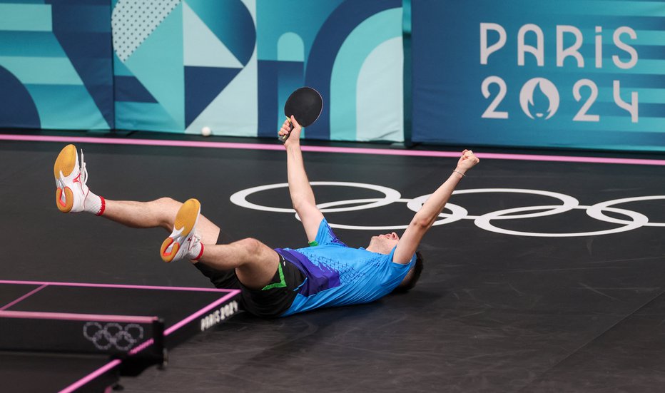 Fotografija: Deni Kožul se je silno razveselil prve olimpijske zmage. FOTO: Paul Childs/Reuters