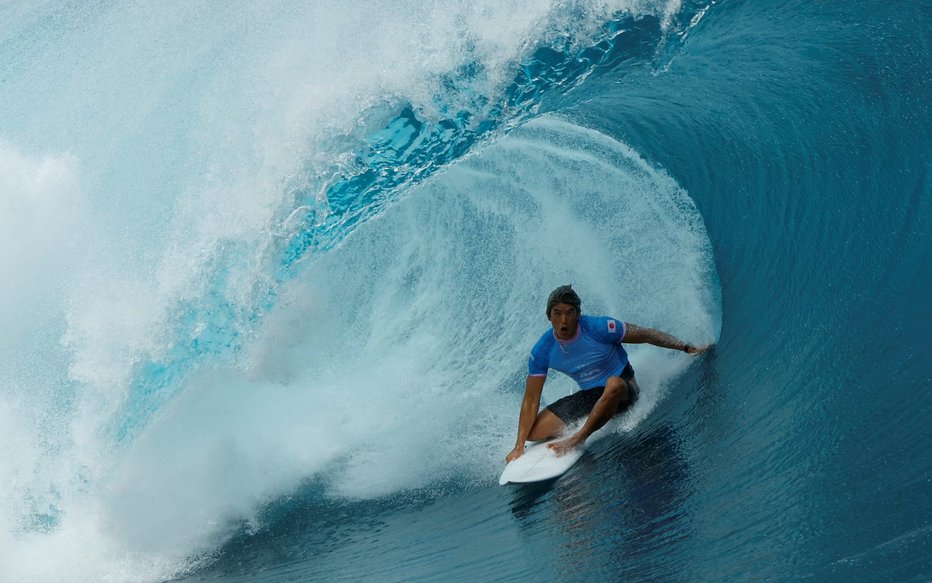 Fotografija: Deskanje na Tahitiju je prav osvežilno. FOTO: Ben Thouard Via Reuters