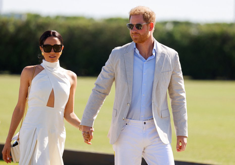 Fotografija: Princ Harry in njegova žena Meghan sta si nabrala že precej sovražnikov. FOTO: Marco Bello Reuters