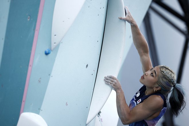 Medtem ko se japonski olimpijci borijo za odličja, njihovo državo pretresajo naravne katastrofe. FOTO: Benoit Tessier Reuters