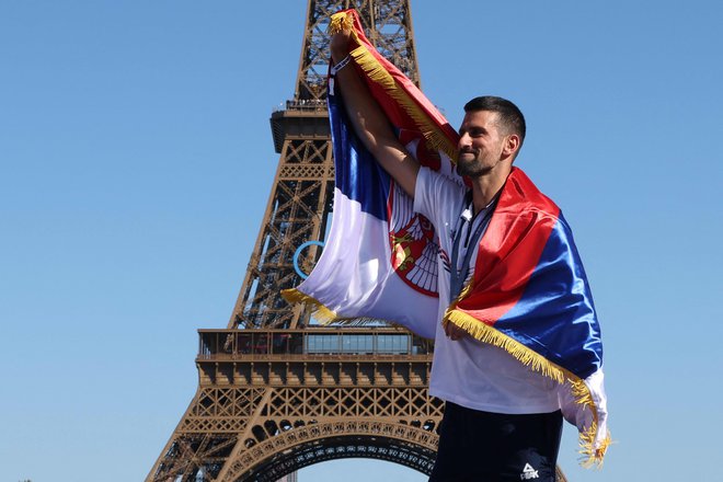 Djokovićevega zmagoslavja v Parizu njegovi navijači ne bodo pozabili. FOTO: Jack Guez Afp