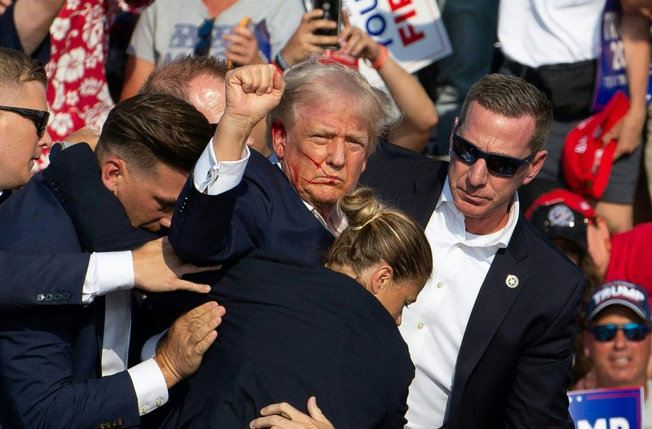 Fotografija: Trump je imel na julijskem predvolilnem zborovanju veliko sreče. FOTO: Rebecca Droke Afp