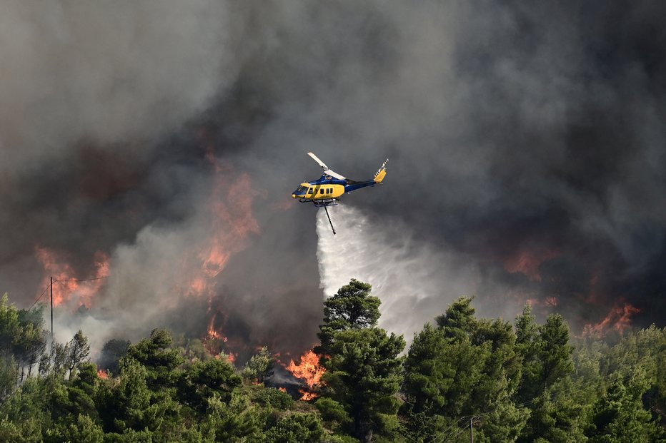 Fotografija: Do popoldneva so pogasili 33 od 40 požarov. FOTO: Michalis Karagiannis Via Reuters