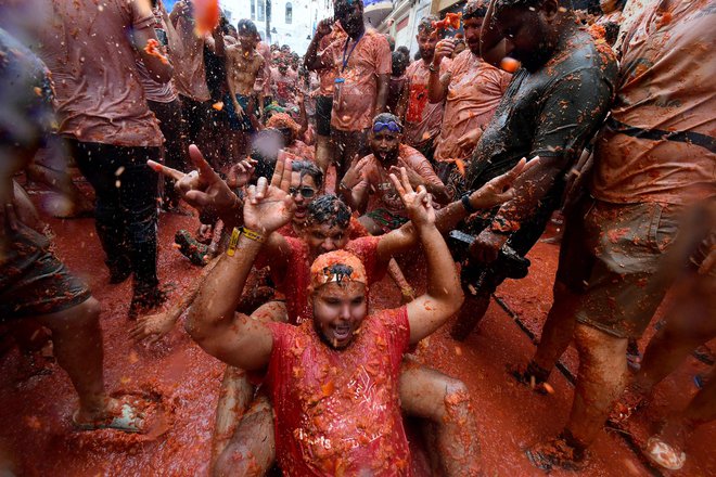 La Tomatino so letos pripravili že sedeminsedemdesetič. FOTO: Jose Jordan/AFP