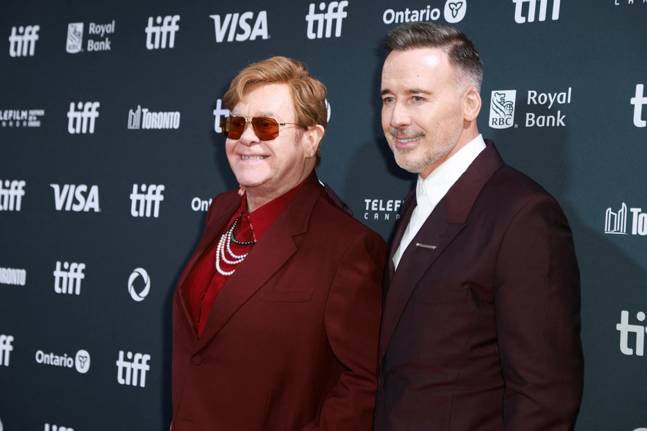 Fotografija: Elton John in David Furnish. FOTO: Carlos Osorio/Reuters