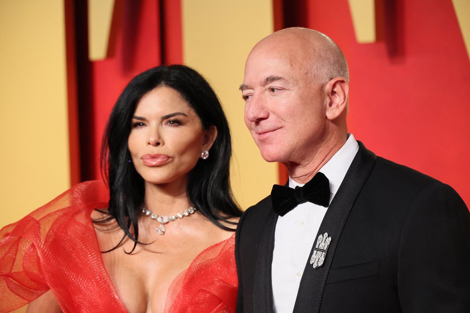 Fotografija: Jeff Bezos in Lauren Sanchez FOTO: Danny Moloshok/Reuters