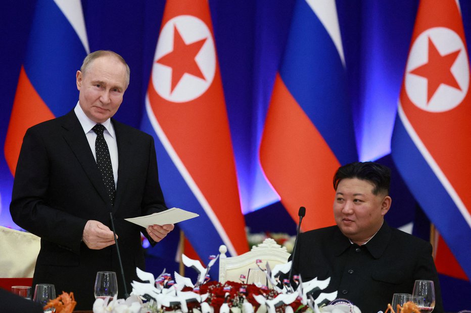 Fotografija: Vladimir Putin in Kim Džong Un.FOTO: Vladimir Smirnov Via Reuters