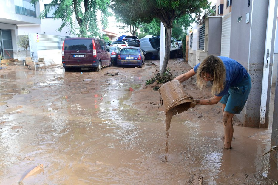 Fotografija: Uradno število smrtnih žrtev po zadnjih podatkih znaša 95, vendar bi lahko še naraslo. FOTO: Jose Jordan Afp