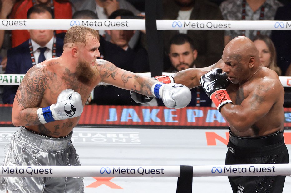 Fotografija: Jake Paul in Mike Tyson. FOTO: Christian Petersen, Getty Images Via Afp